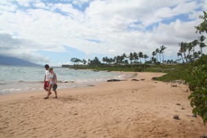 A couple on Mokapu Beach. A couple enjoys Mokapu Beach all to themselves.