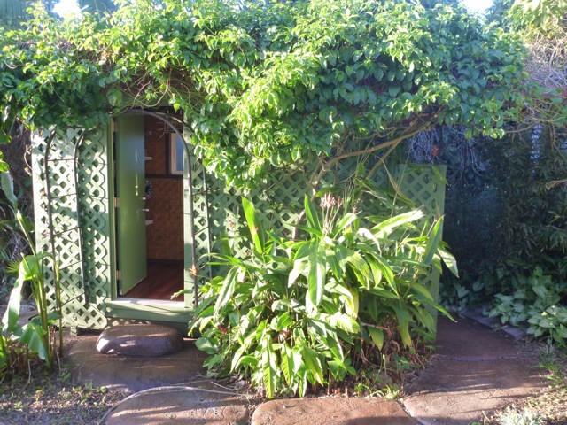 cottage-bath-exterior COTTAGE: The private cottage bathroom building is covered with lilikoi, yum!
