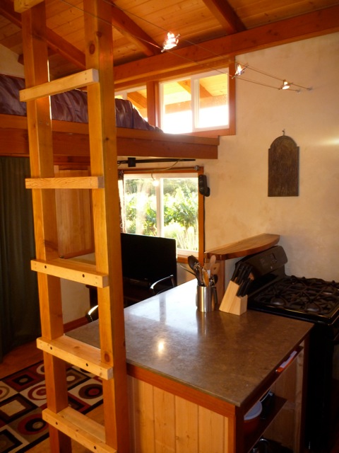 cottage-loft-ladder COTTAGE: Loft ladder in foreground, TV in background