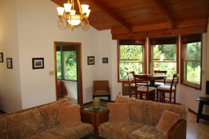 Livingroom foreground, dining and guest bedroom background Livingroom foreground, dining and guest bedroom background