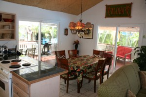 hale-palama-dining-kitchen-living-room Inside and outside dining tables.